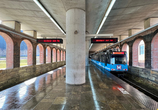 A train pulls into Laclede's Landing MetroLink Station.